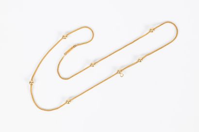 Collier en or tressé et petites perles d'or....