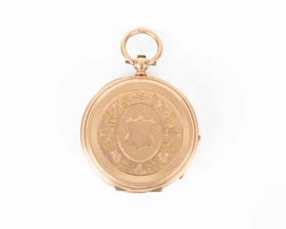 Montre de col en or guilloché et gravé de...