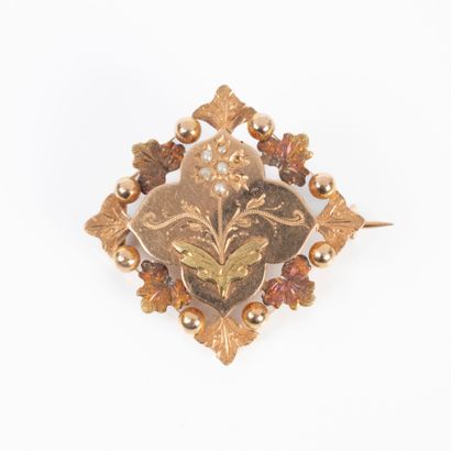Broche rosace en or rose et jaune serti de...