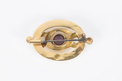 Broche en or sertie d'améthystes (manque...