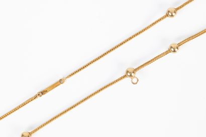 Collier en or tressé et petites perles d'or....