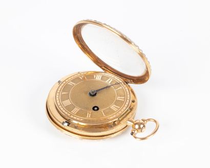 Montre de poche en or sertie de demi-perles...
