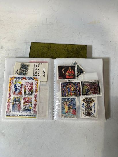 A box containing mint and cancelled stamps...