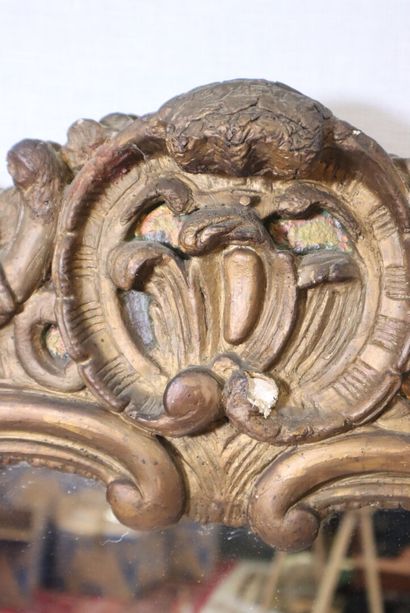 Molded and carved wood mirror with rocaille...