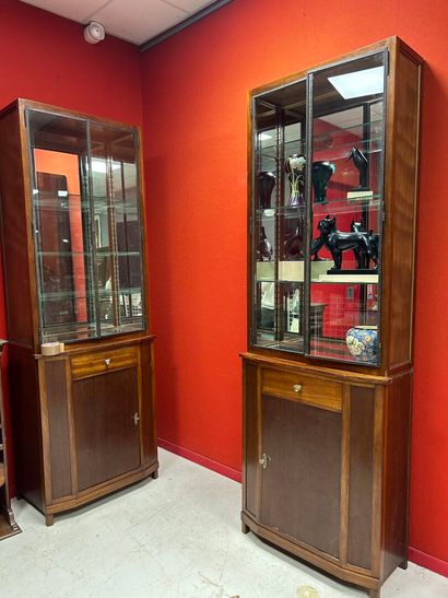 Two wooden display medicine cabinets, the...