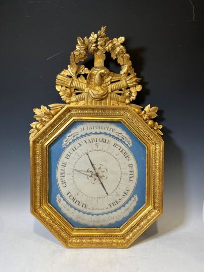 Gilded wood octagonal barometer decorated...