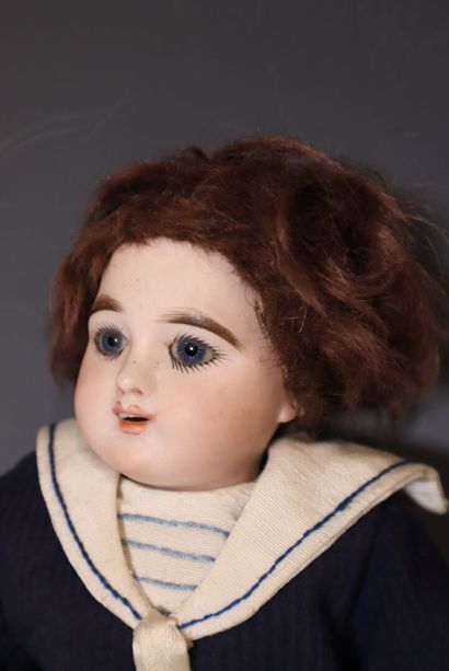 Set of two wooden dolls with porcelain heads...