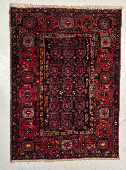 Oriental wool carpet, navy background and...