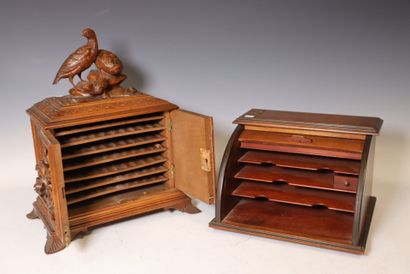 Cigar cabinet in carved natural wood 
40...