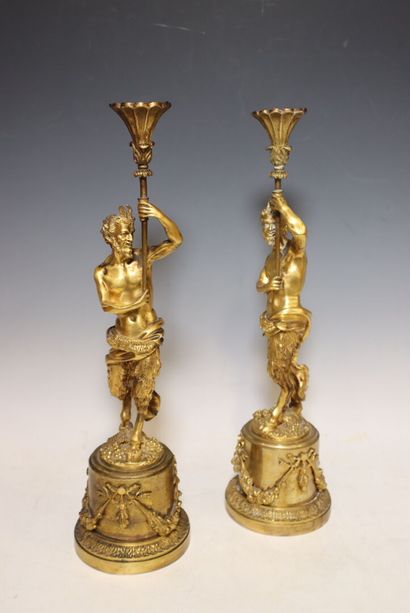 Pair of ormolu candlesticks, the shafts formed...