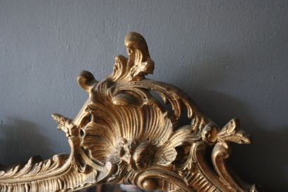 Wood and gilded stucco mirror with Baroque...