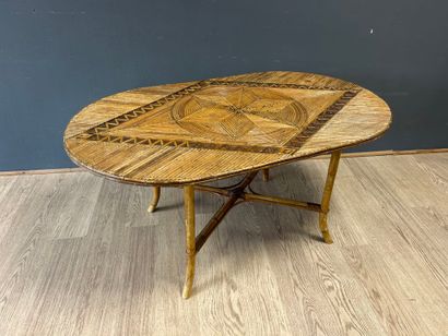 Rattan coffee table, bamboo base. 
69 x 121...