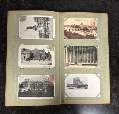 An album containing 500 old postcards on...