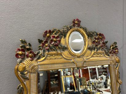 Gilded wood and polychrome rechambered mirror,...