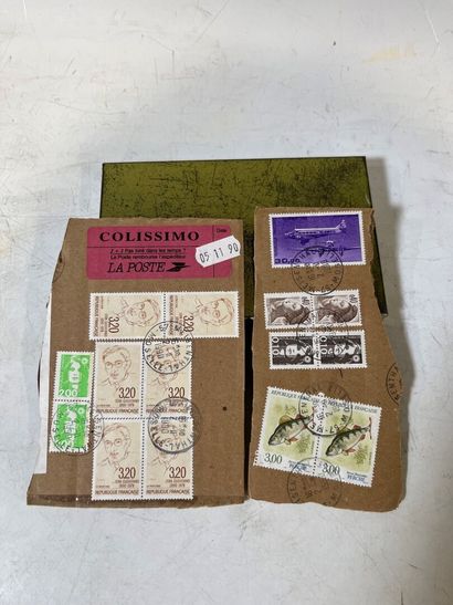 A box containing mint and cancelled stamps...
