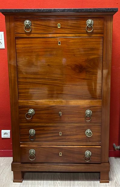 Mahogany-veneered oak writing desk opening...
