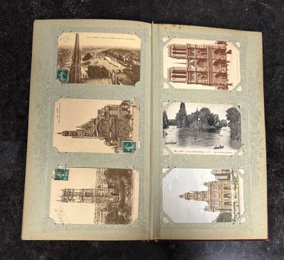 An album containing 500 old postcards on...