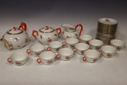 Porcelain tea and coffee set with rose decoration
Comprising...