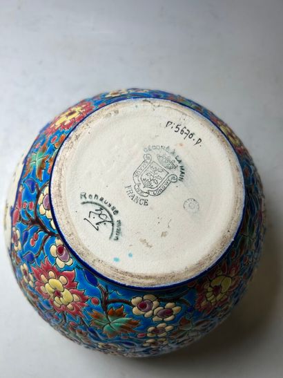 LONGWY. 
Earthenware ball vase with enameled...
