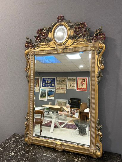 Gilded wood and polychrome rechambered mirror,...