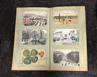 An album containing 500 old postcards on...