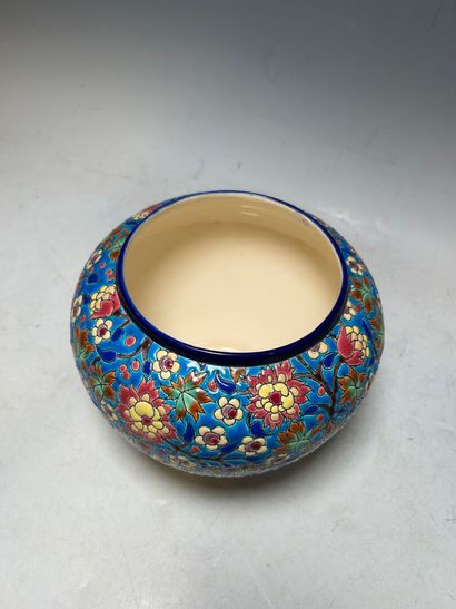 LONGWY. 
Earthenware ball vase with enameled...