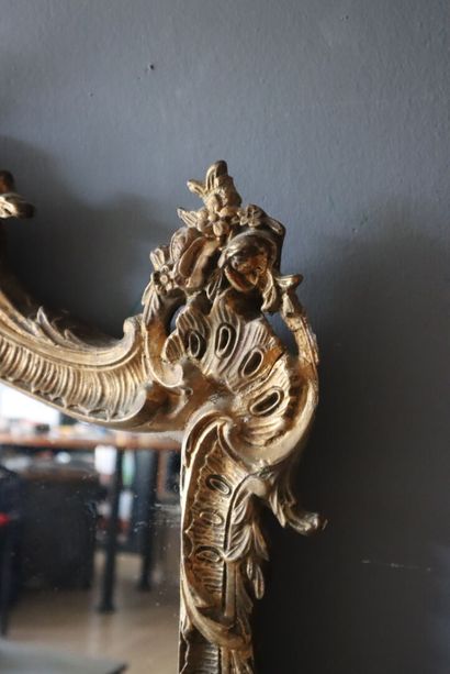Wood and gilded stucco mirror with Baroque...