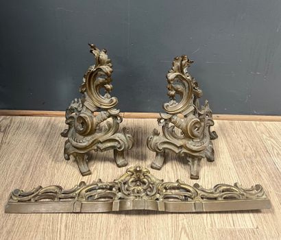 Pair of chased and gilded bronze andirons...