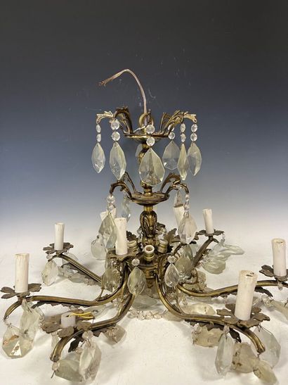 Gilded metal chandelier with eight arms of...