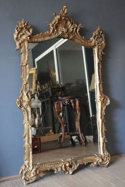 Wood and gilded stucco mirror with Baroque...