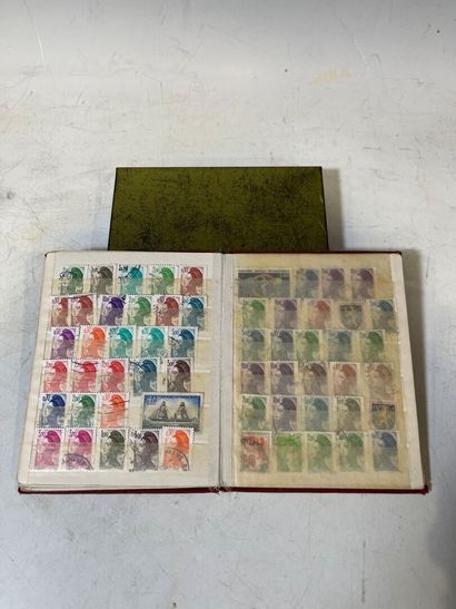A box containing mint and cancelled stamps...