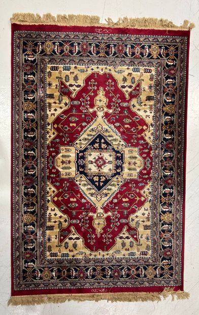 Wool and silk rug with red background. 
170...