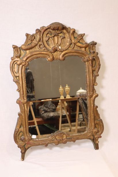 Molded and carved wood mirror with rocaille...