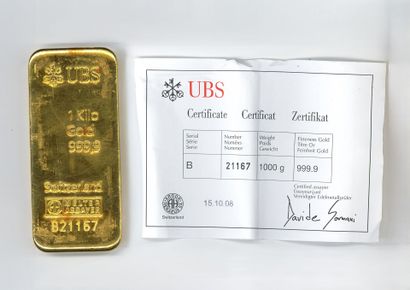 Lingot d'or UBS n° B21167, avec son bulletin...