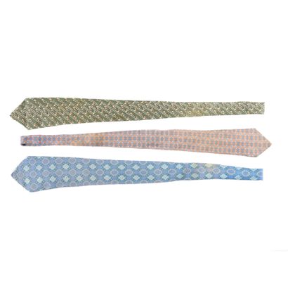 HERMES. 3 silk ties, dominant bronze/ blue/...