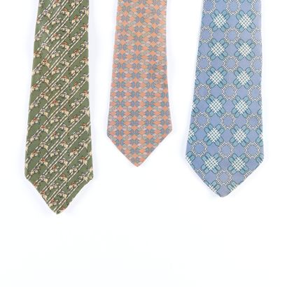 HERMES. 3 silk ties, dominant bronze/ blue/...