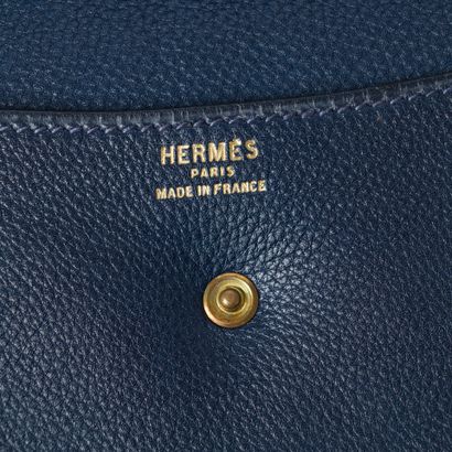 HERMES. Soft navy leather pouch, clasp with...