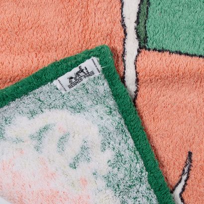 HERMES. Cotton bath towel decorated with...