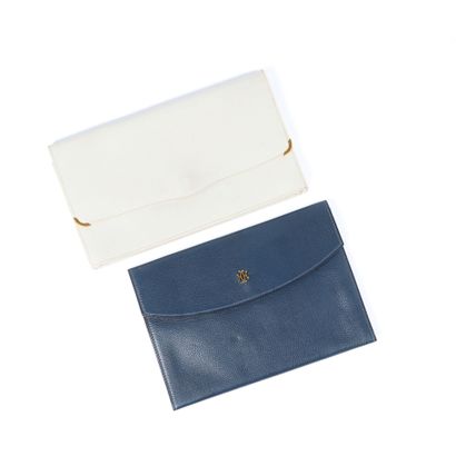 HERMES. Soft navy leather pouch, clasp with...