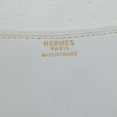 HERMES. Soft navy leather pouch, clasp with...