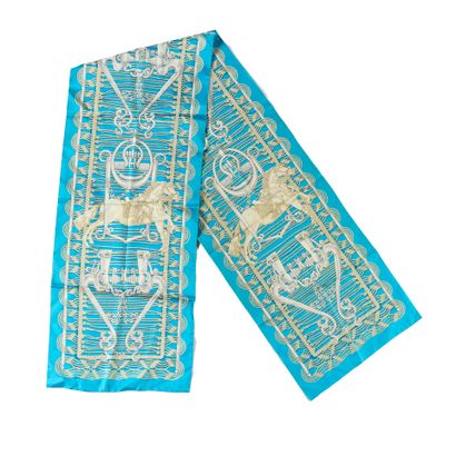 HERMES. Stole in turquoise and beige silk,...