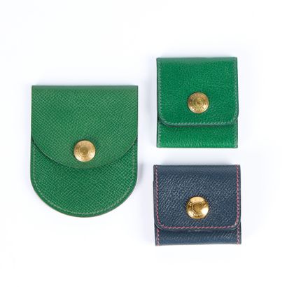 HERMES. Set of 3 small cases:
- navy leather...