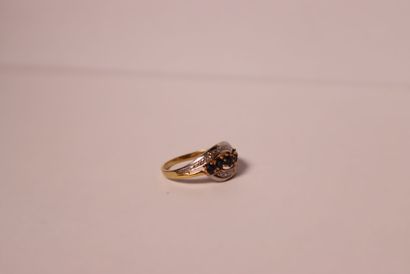 Yellow and white gold ring decorated with...