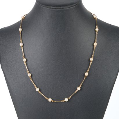 Gold necklace, baton links alternating with...
