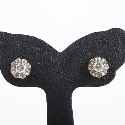 Pair of ear studs in white gold, each set...