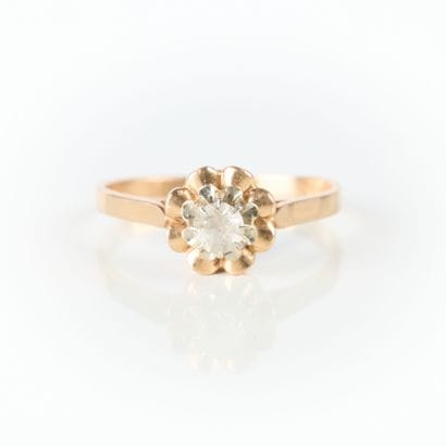 Solitaire ring in two-tone gold set with...
