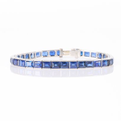 White gold rivière bracelet set with 34 calibrated...