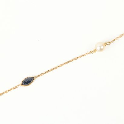Gold bracelet set with 3 cultured pearls...