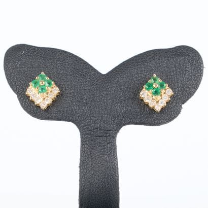 Pair of gold (750‰) ear studs, each set with...