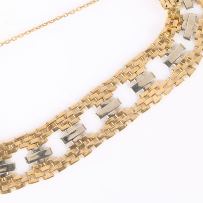 Two-tone gold band bracelet with geometric...